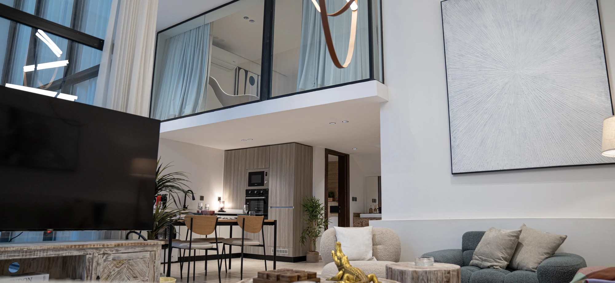 Double-height living room in Najla Residence apartment 106